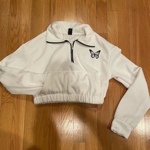 White long sleeve crop top with butterfly